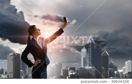 Woman doing amazing selfie 30634108