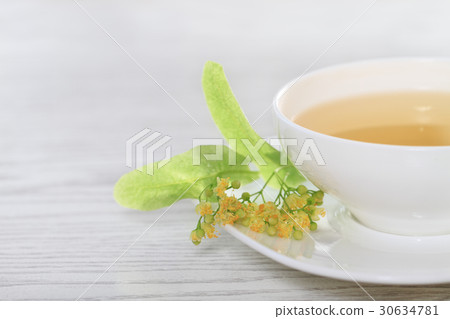 Cup with linden tea 30634781