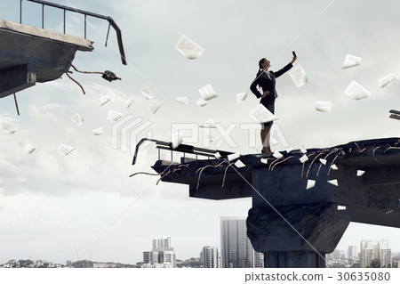 Businesswoman catching moment on her mobile 30635080