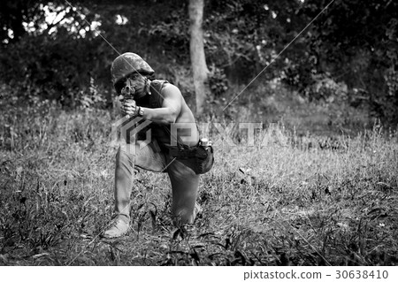Military maneuvers in the woods. Military maneuvers in the woods. 30638410