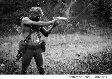 Military maneuvers in the woods. 30638412