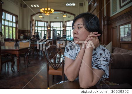 Asia women thao chin in coffee shop vintage style Asia women thao chin in coffee shop vintage style 30639202