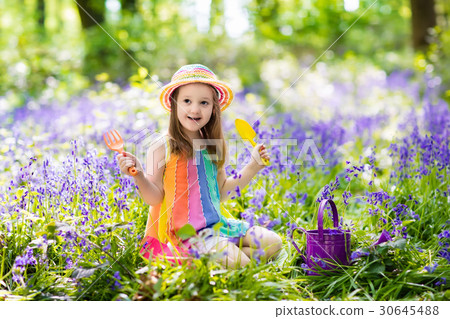 Kids in bluebell garden 30645488