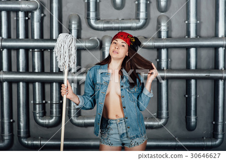 Beautiful sexy girl with a mop in hands 30646627