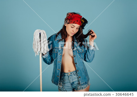Beautiful sexy girl with a mop in hands 30646645