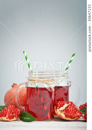 Pomegranate juice in jar Pomegranate juice in jar 30647155