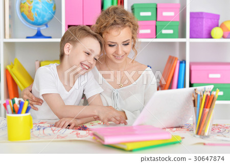 Mom and son doing lessons Mom and son doing lessons 30647874