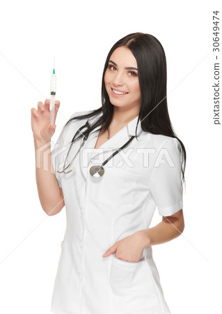 A portrait of a young female doctor smiling with a 30649474