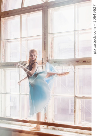 Ballerina dancing at window sill background 30649627