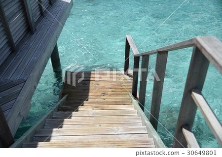 Maldives Water Cottage Stairs descending directly to the sea 30649801