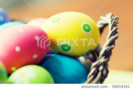 close up of colored easter eggs in basket close up of colored easter eggs in basket 30659161