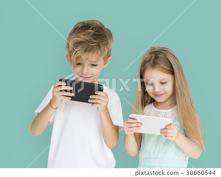 Young Kids Playing Mobile Phone 30660544