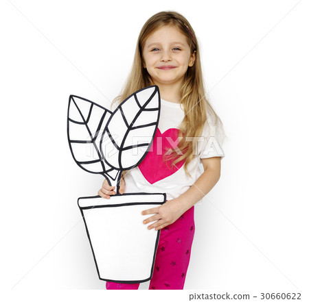 Little Girl Holding Papercraft Plant Smiling 30660622