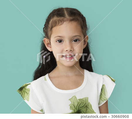 Young little girl with awkward smile expression portrait 30660908
