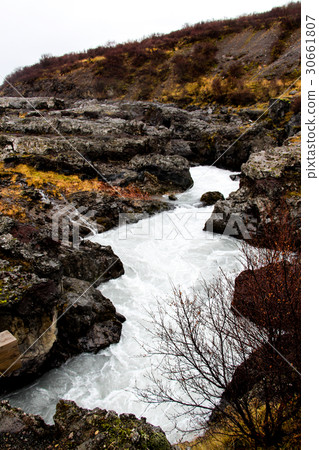 Landscape view of Hraunfossar, Lava Falls. Landscape view of Hraunfossar, Lava Falls. 30661807