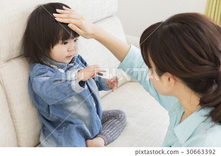 Thermometer and child Thermometer and child 30663392