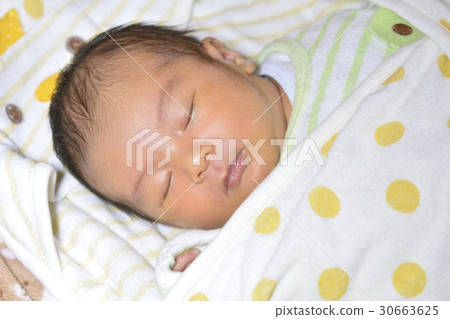 Baby sleeping in a baby bed Baby sleeping in a baby bed 30663625