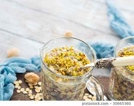 Chia oat pudding with quinoa, banana, pistachio 30665360