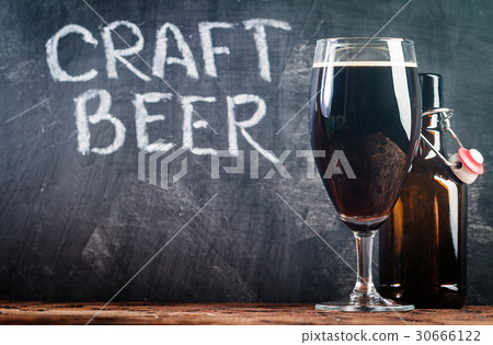 Glass of dark beer Glass of dark beer 30666122