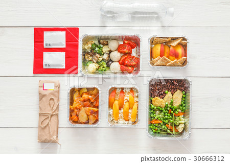Healthy food take away in boxes, top view at wood 30666312