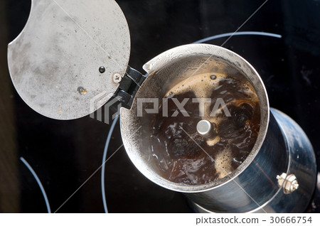 making hot coffee 30666754