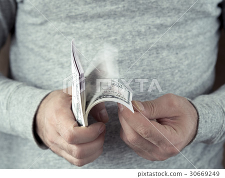 Hands counting dollars 30669249