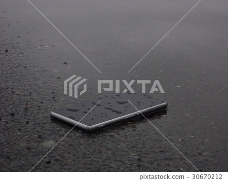 Smartphone wet in the rain 30670212