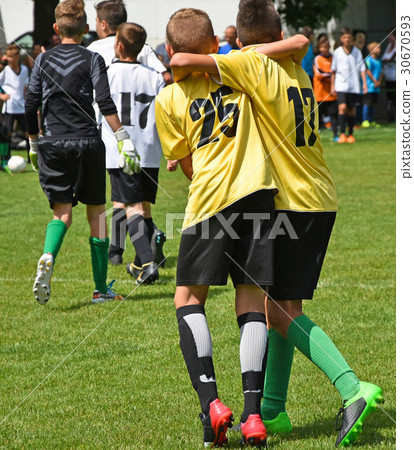 Young soccer players are happy Young soccer players are happy 30670593