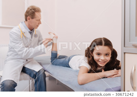 Enchanting beautiful child meeting her doctor Enchanting beautiful child meeting her doctor 30671242