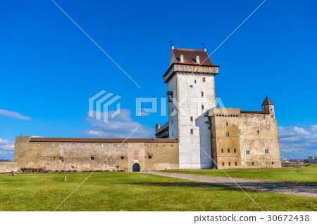 Hermann Castle facade on sunny day, Narva 30672438