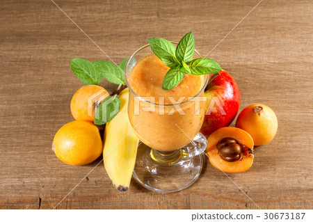 Diet smoothies from loquats, bananas and apples. Diet smoothies from loquats, bananas and apples. 30673187