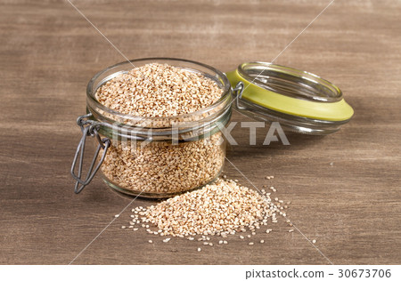 sesame seeds On a wooden background sesame seeds On a wooden background 30673706