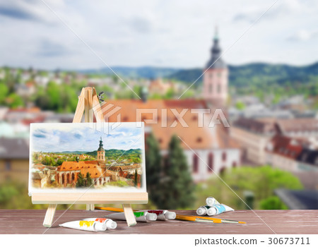 Easel with a watercolor painting 30673711