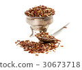 Flax seed on white background 30673718