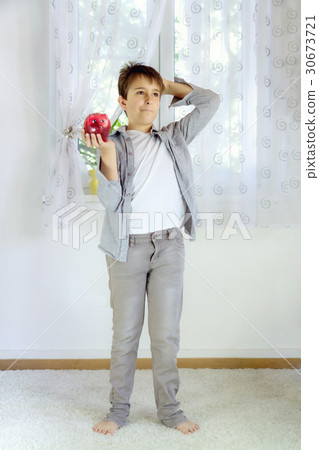 School boy with piggy bank 30673721