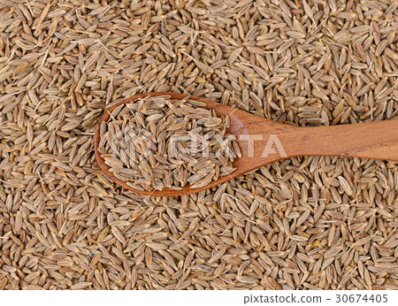 Caraway  seeds close up isolated on background. 30674405