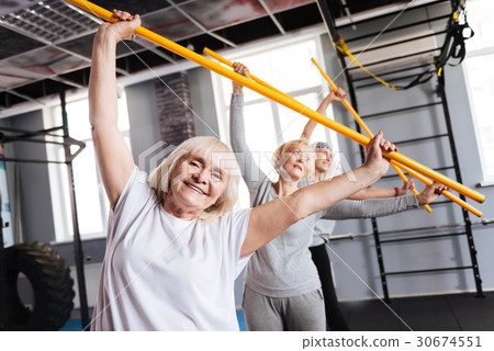 Sporty aged women holding gymnastic sticks-照片素材（圖片） [30674551] - PIXTA圖庫