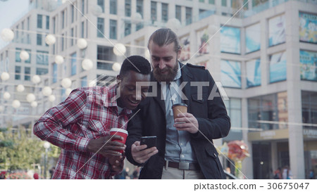 Two different people having a candid talk. 30675047