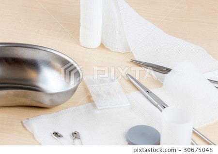 A table with medical instruments 30675048