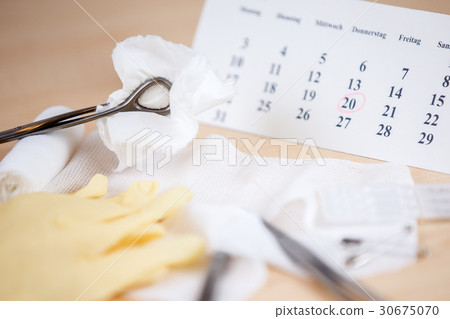 A table with medical instruments 30675070