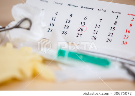 A table with medical instruments A table with medical instruments 30675072