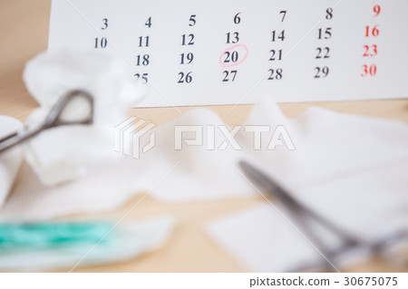 A table with medical instruments A table with medical instruments 30675075