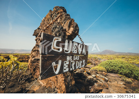 Entrance to volcanic Cueva de los Verdes cave Entrance to volcanic Cueva de los Verdes cave 30675341