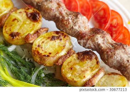 Barbecue Lula Kebab with minced meat, vegetables 30677213