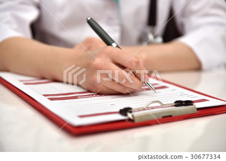 Hand Filling Medical History 30677334