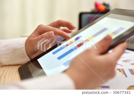 Digital tablet with financial data 30677381