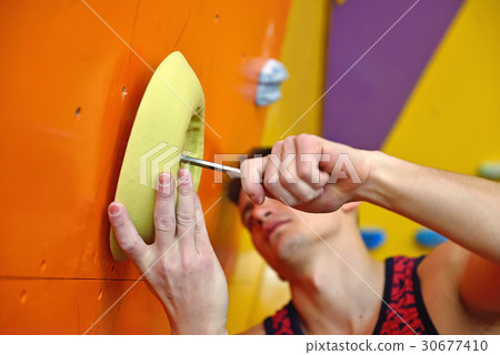 climber will  gathers an artificial wall 30677410