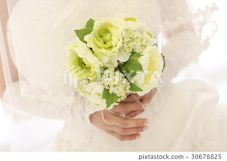 A bride with a bouquet A bride with a bouquet 30678825