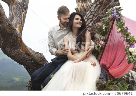 Young attractive couple together outdoors 30679641