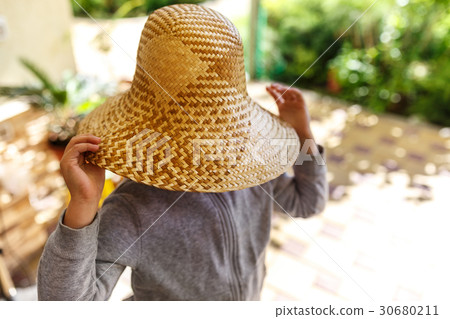 Cute little girl in straw hat, spring outdoor. Cute little girl in straw hat, spring outdoor. 30680211